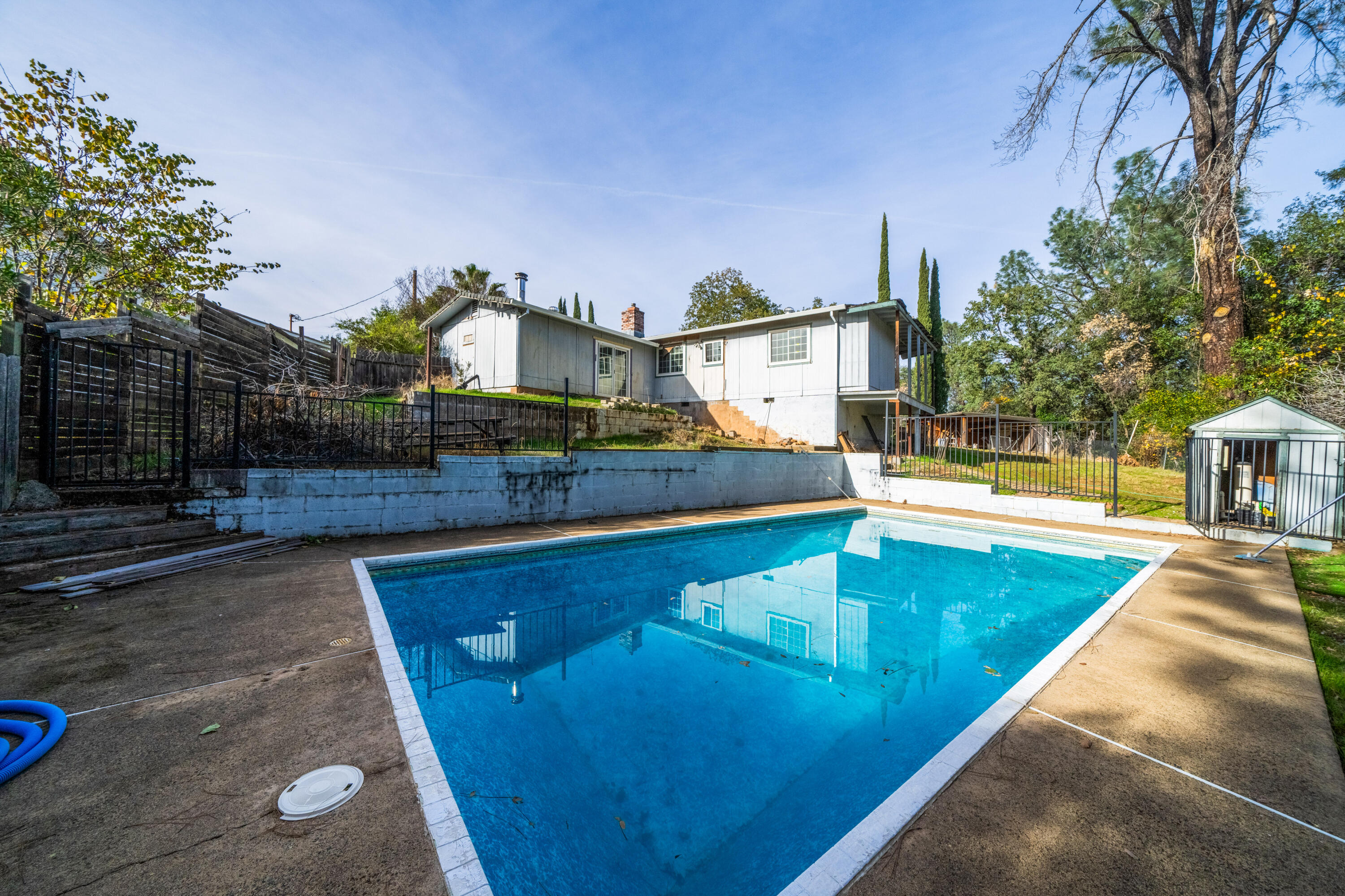a view of a house with swimming pool