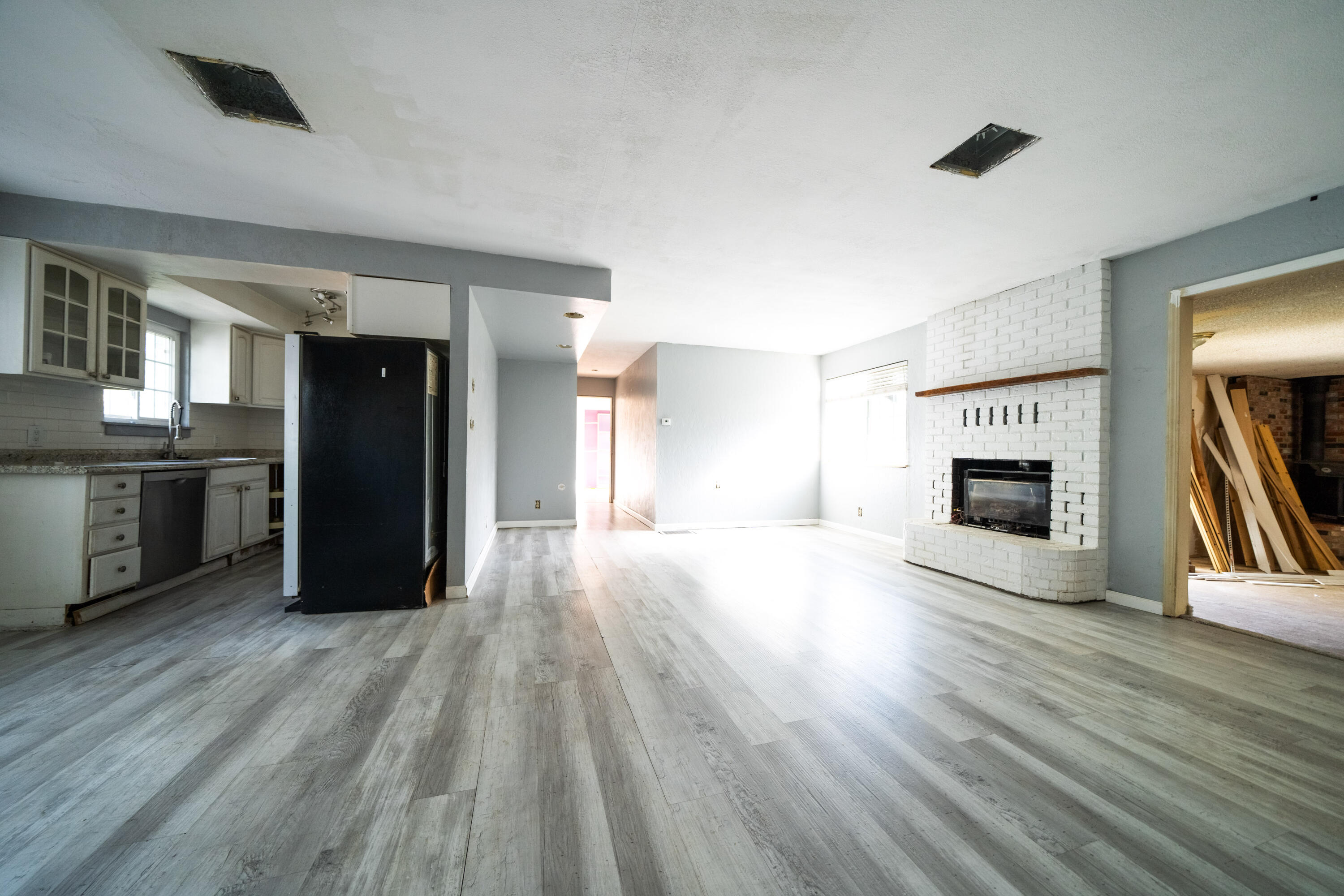 1330 Scenic Way Redding, CA 96001 - Photo 11 of 43 a view of a kitchen with wooden floor and a ceiling fan