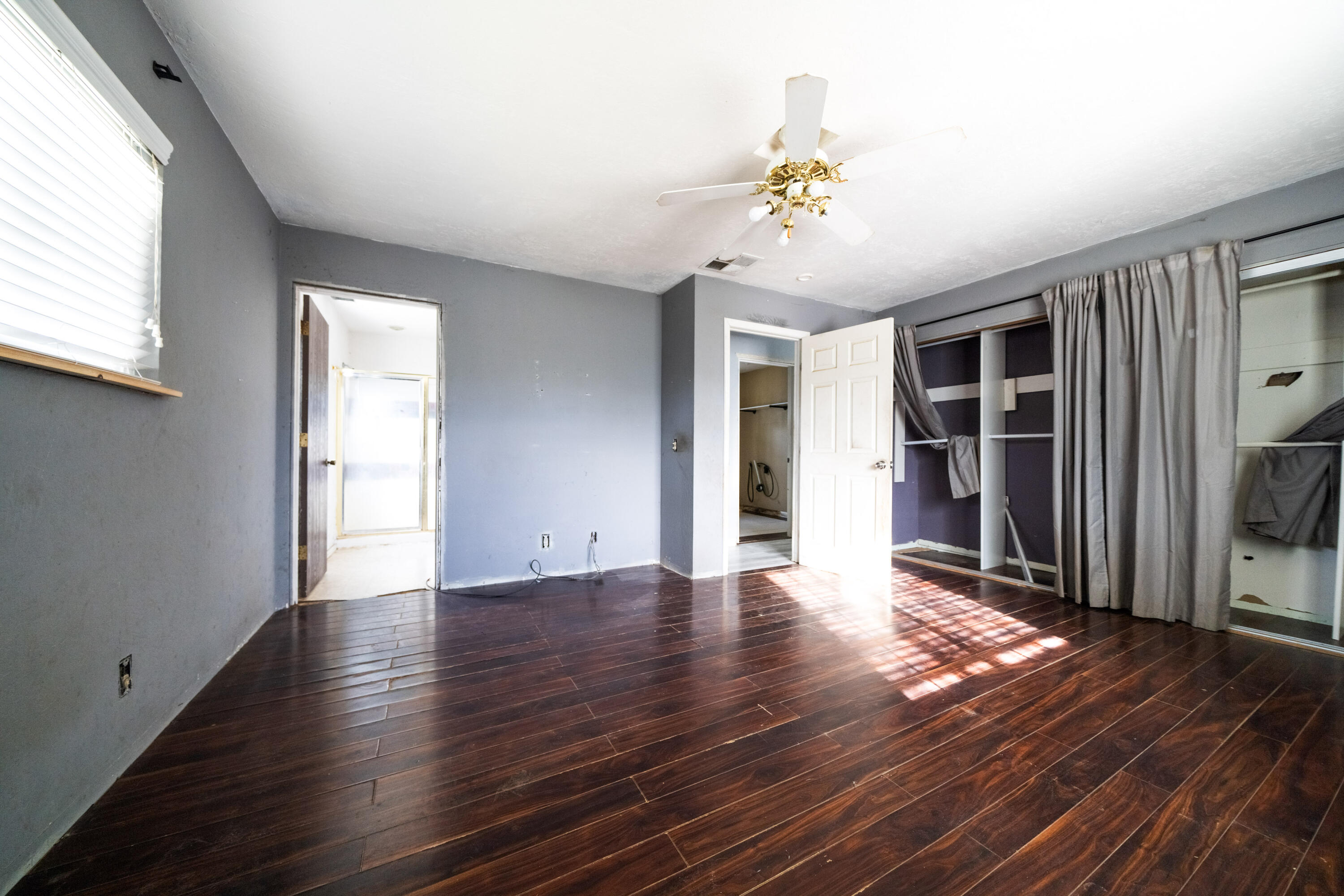 1330 Scenic Way Redding, CA 96001 - Photo 13 of 43 an empty room with wooden floor and windows