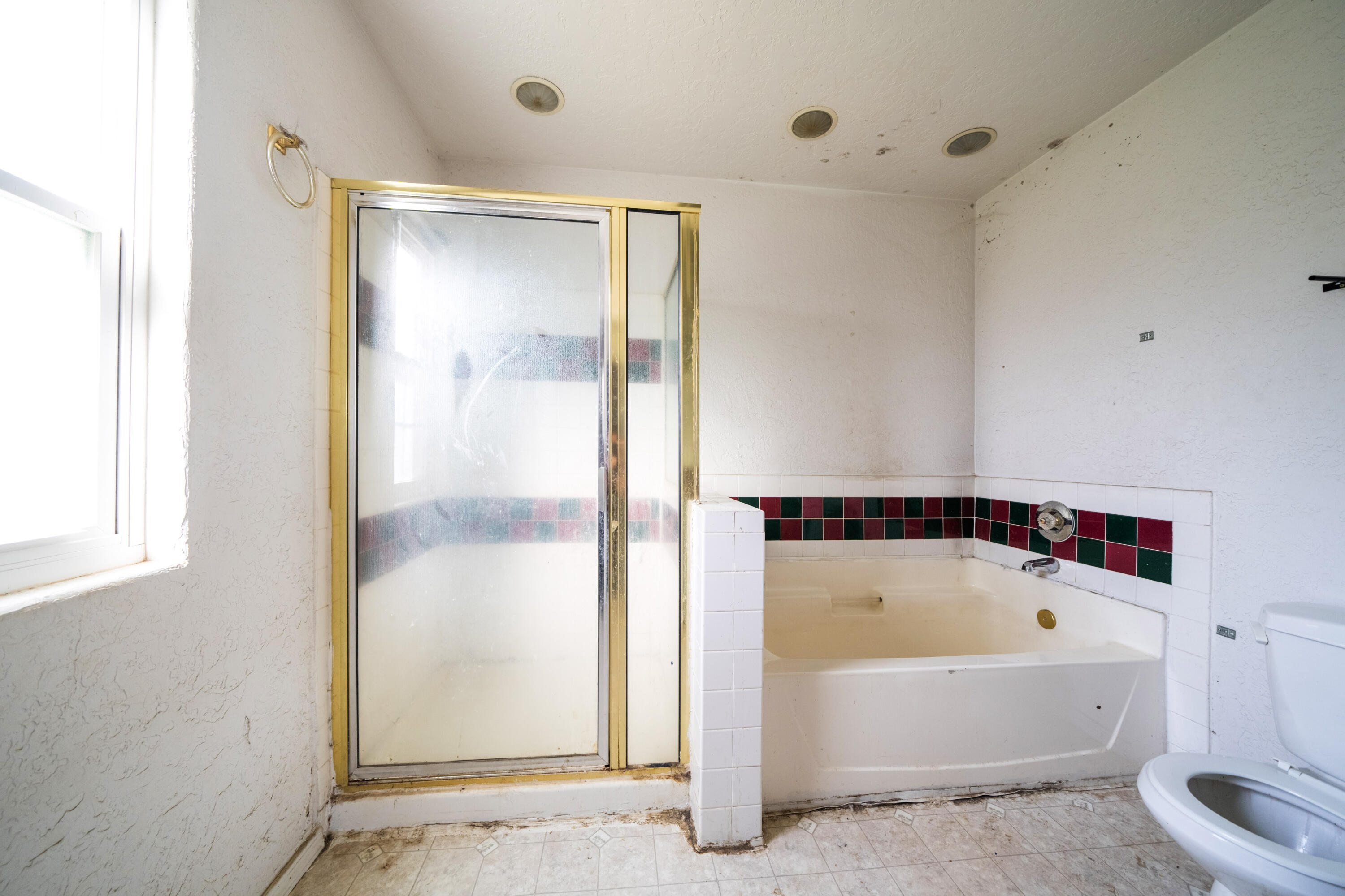 1330 Scenic Way Redding, CA 96001 - Photo 14 of 43 a bathroom with a bathtub and a shower