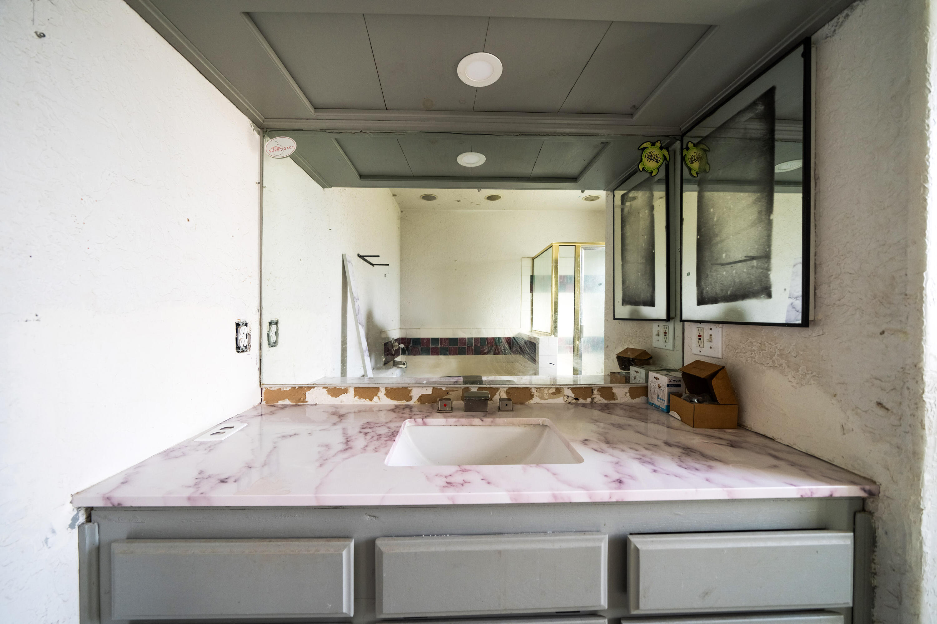 1330 Scenic Way Redding, CA 96001 - Photo 15 of 43 a bathroom with a granite countertop sink and a mirror