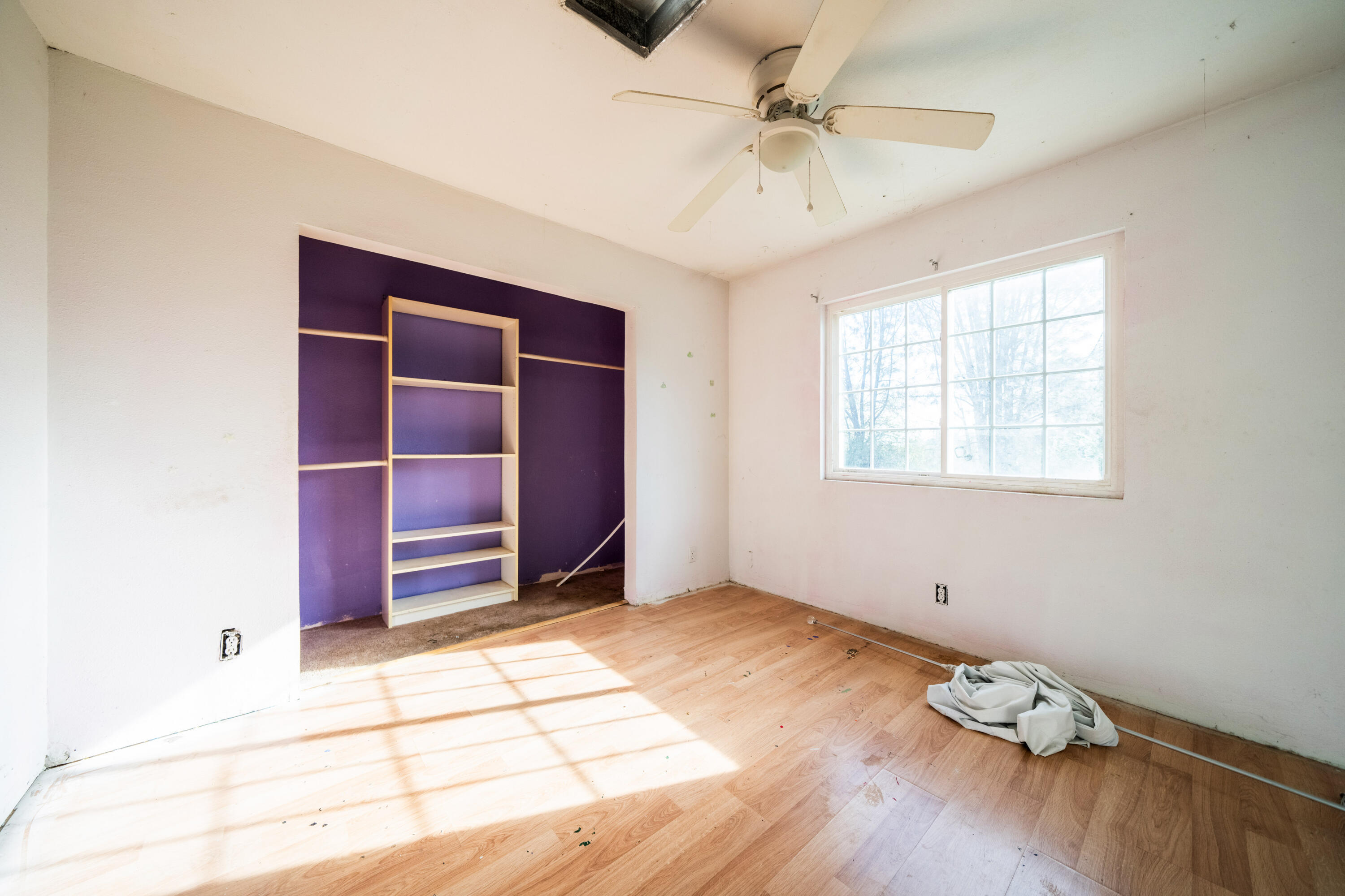 1330 Scenic Way Redding, CA 96001 - Photo 16 of 43 a view of wooden floor and windows in a room