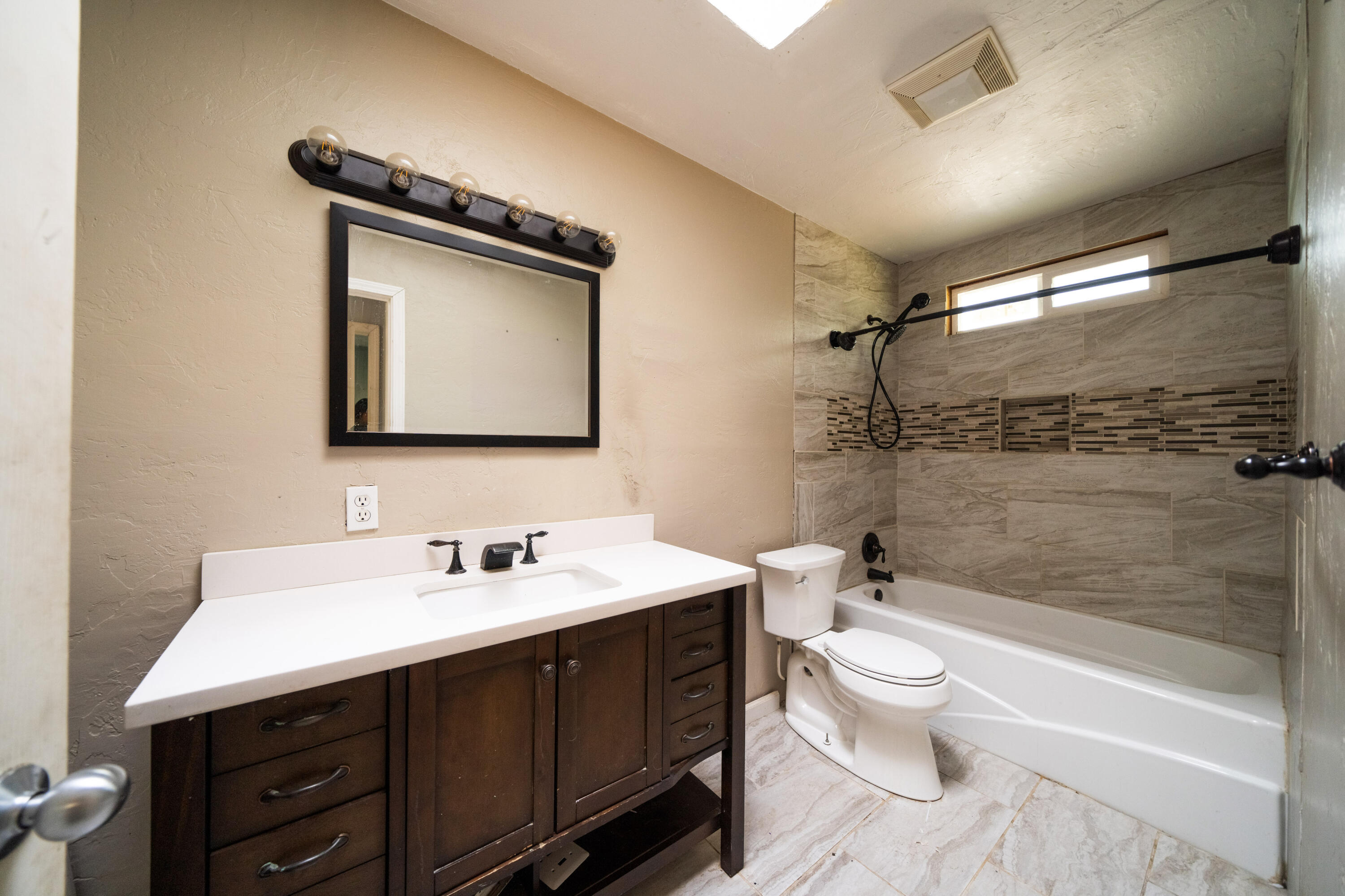1330 Scenic Way Redding, CA 96001 - Photo 19 of 43 a bathroom with a double vanity sink toilet and shower
