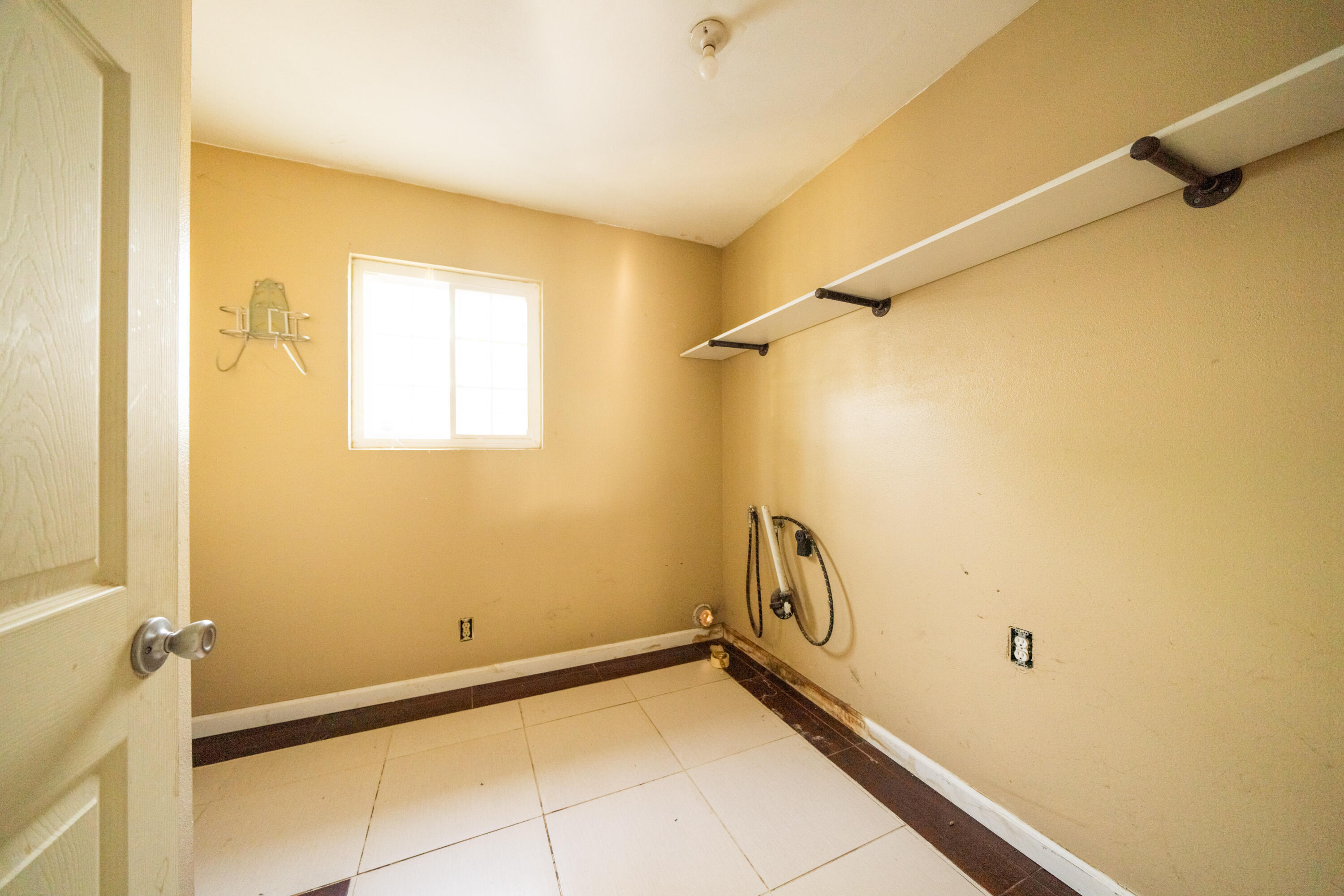 1330 Scenic Way Redding, CA 96001 - Photo 20 of 43 a view of a room with rack on the wall and a window