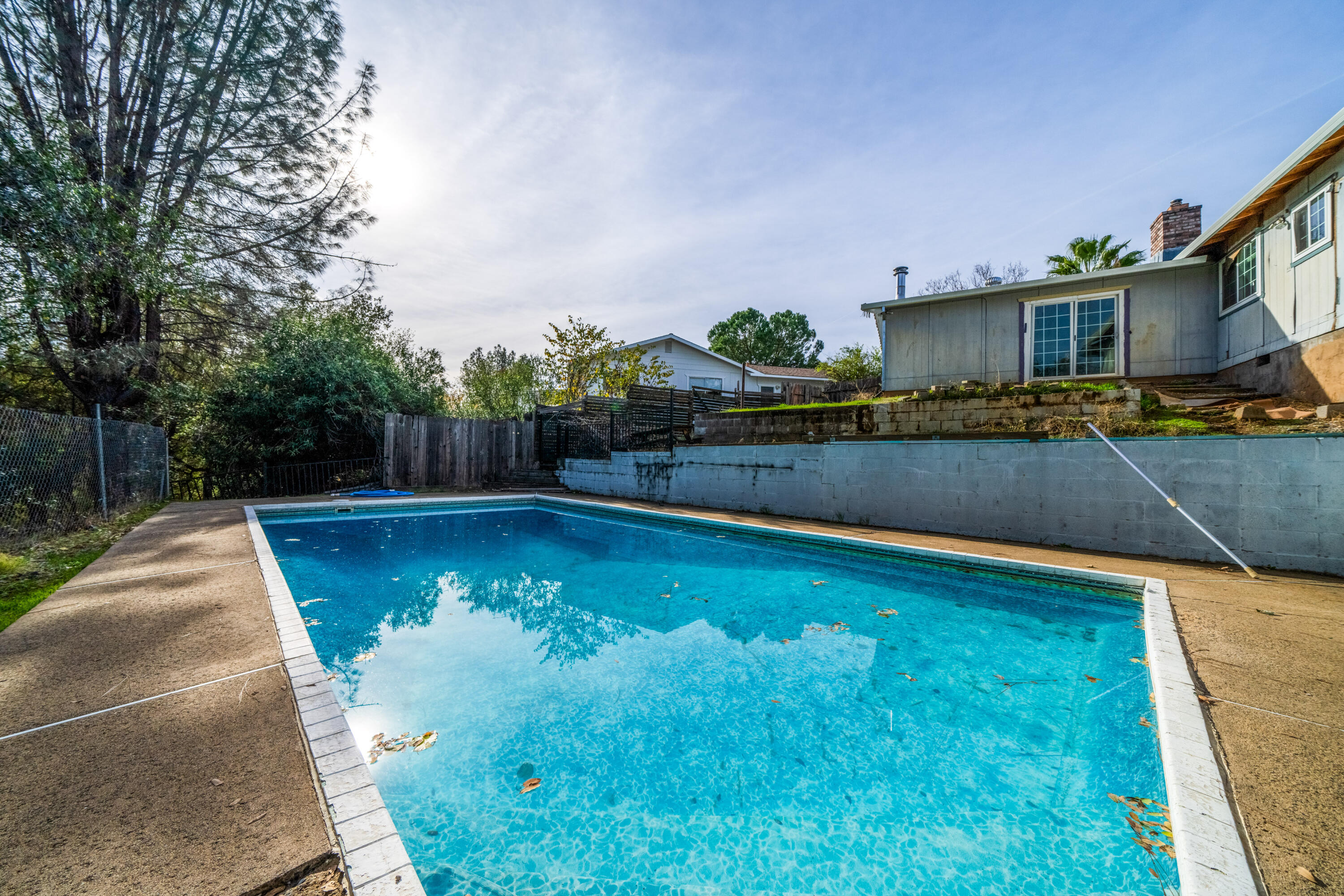1330 Scenic Way Redding, CA 96001 - Photo 24 of 43 a view of a swimming pool with a patio