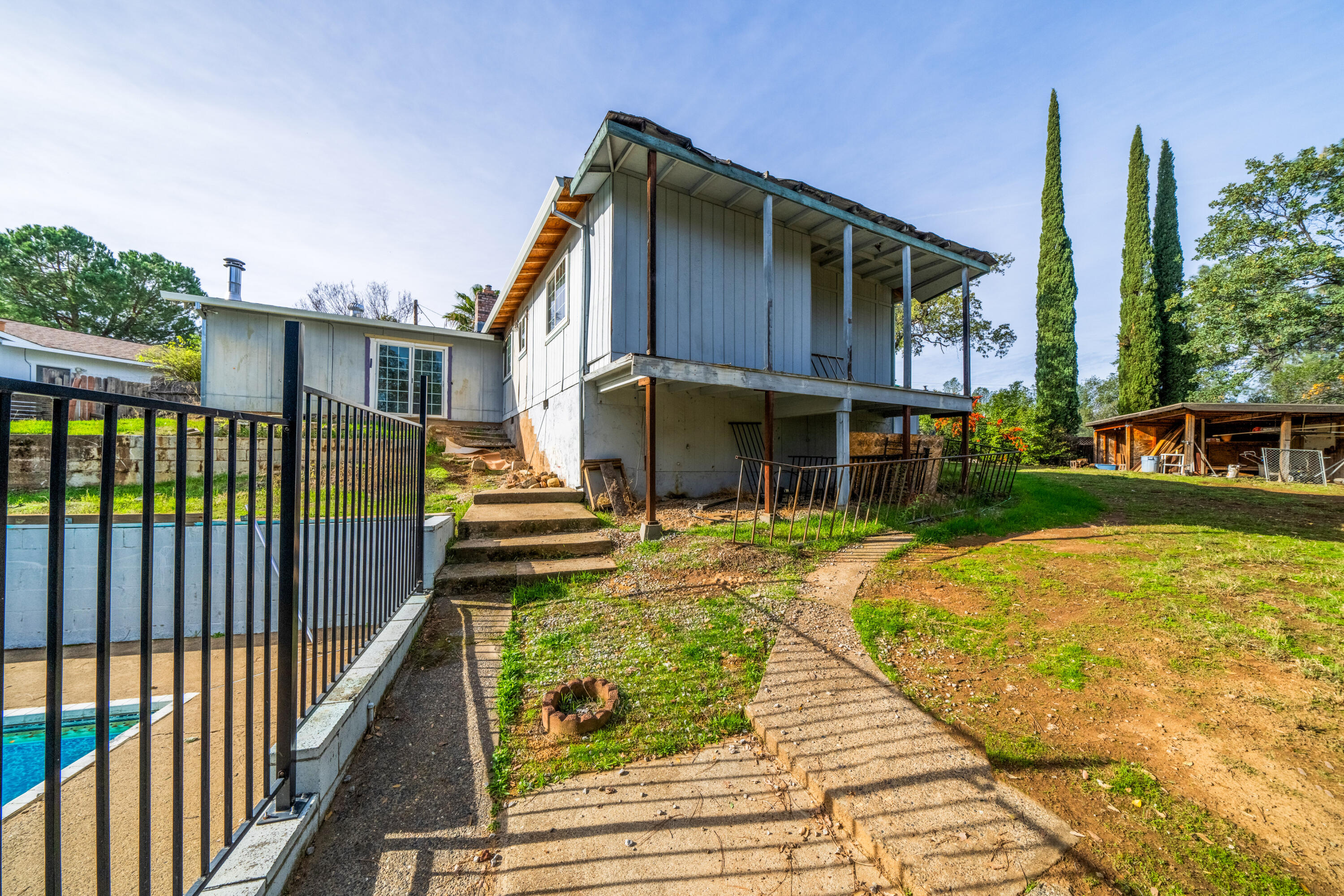 1330 Scenic Way Redding, CA 96001 - Photo 26 of 43 a porch with a yard