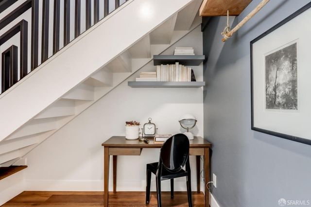 a view of entryway and workspace