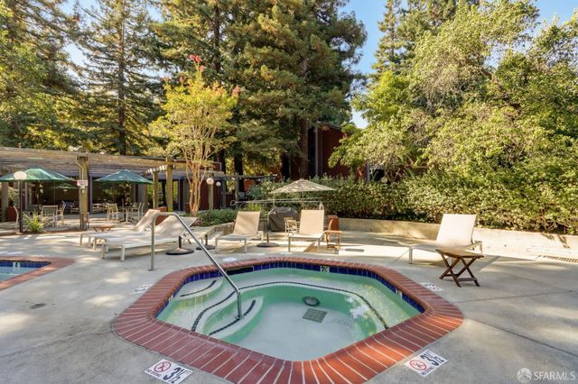 a table and chairs in a patio