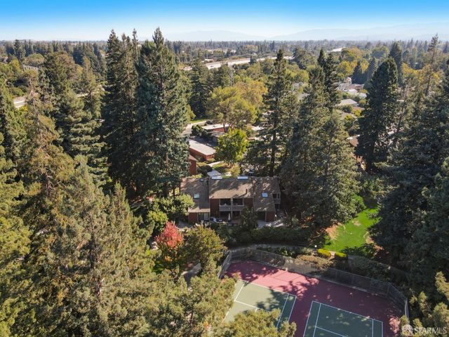 a view of balcony with wooden floor