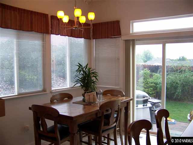 1920 Stargaze Way Reno, NV 89523 - Photo 7 of 11 a view of a dining room with furniture window and outside view