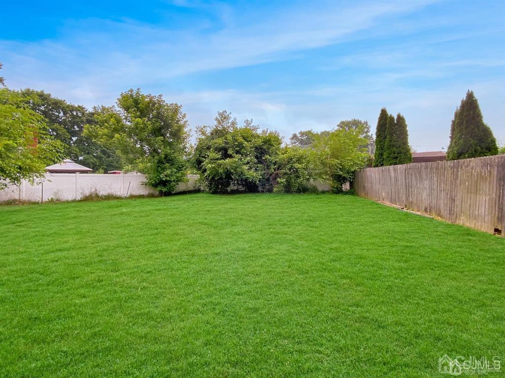 15 Racetrack Road East Brunswick, NJ 08816 - Photo 12 of 13 a view of a garden