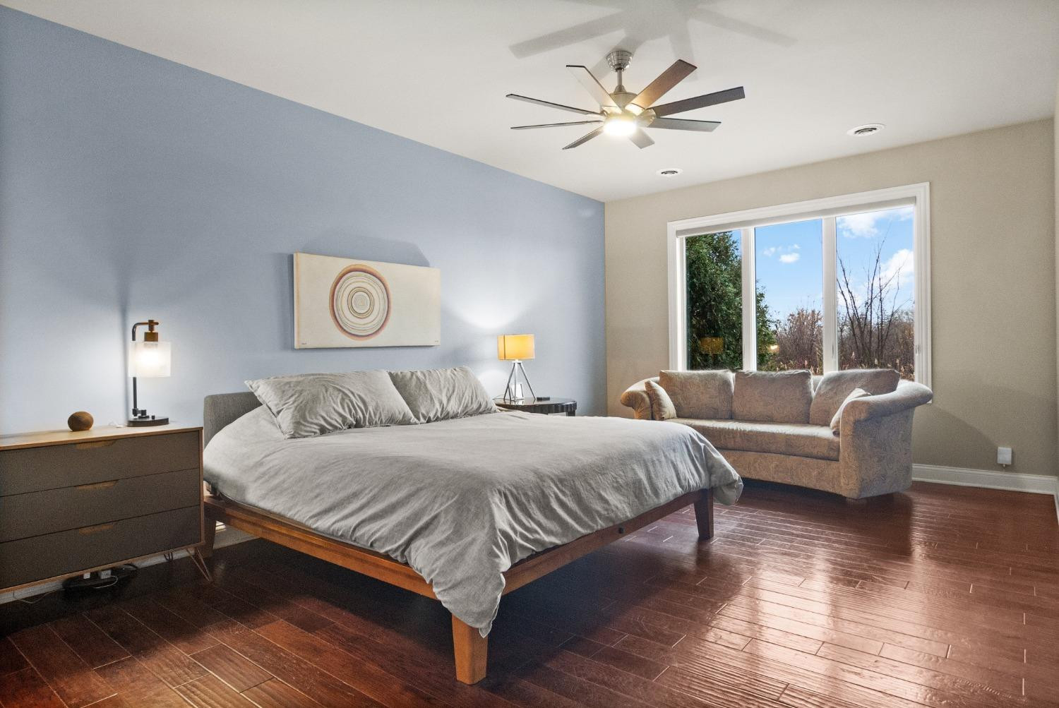 8415 Dancing Waters Lane St. John, IN 46373 - Photo 18 of 31 a bedroom with a large bed and a chandelier