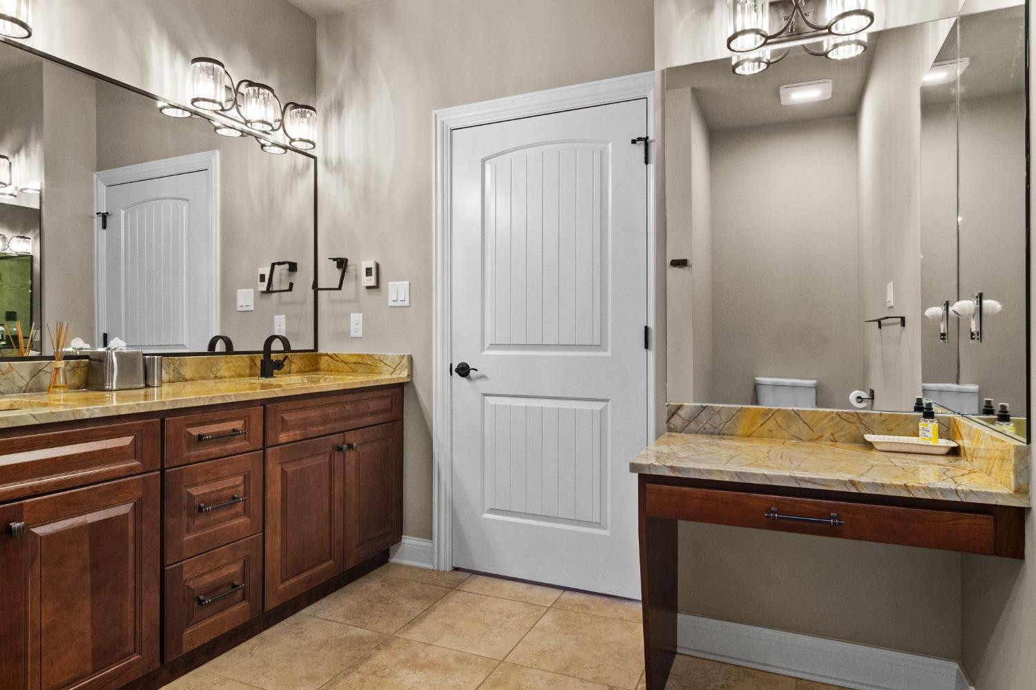 8415 Dancing Waters Lane St. John, IN 46373 - Photo 20 of 31 a bathroom with a granite countertop sink and a mirror