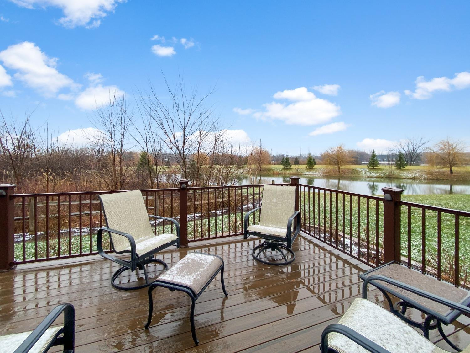 8415 Dancing Waters Lane St. John, IN 46373 - Photo 25 of 31 a view of a chairs and table on the deck