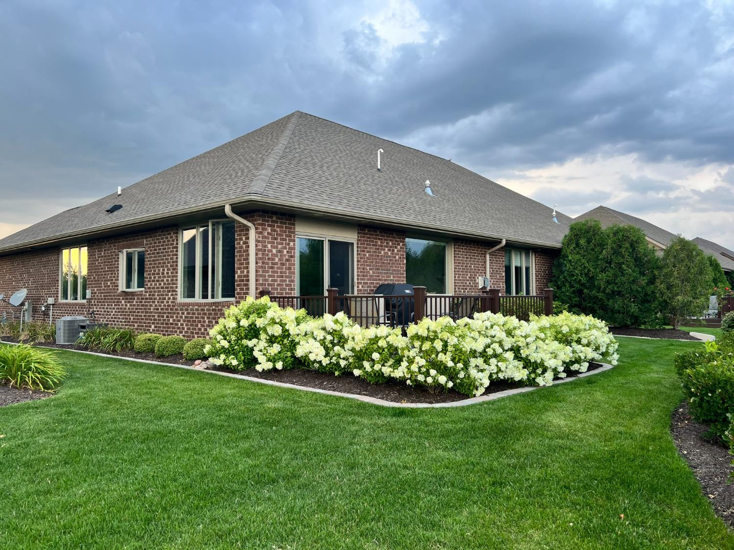 8415 Dancing Waters Lane St. John, IN 46373 - Photo 7 of 31 a front view of a house with a garden