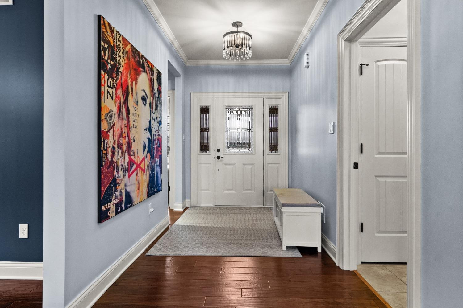 8415 Dancing Waters Lane St. John, IN 46373 - Photo 9 of 31 a view of entryway with wooden floor