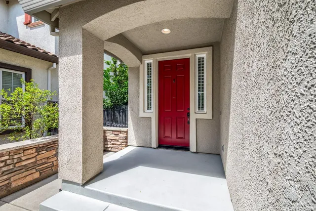 a view of a hallway with windows
