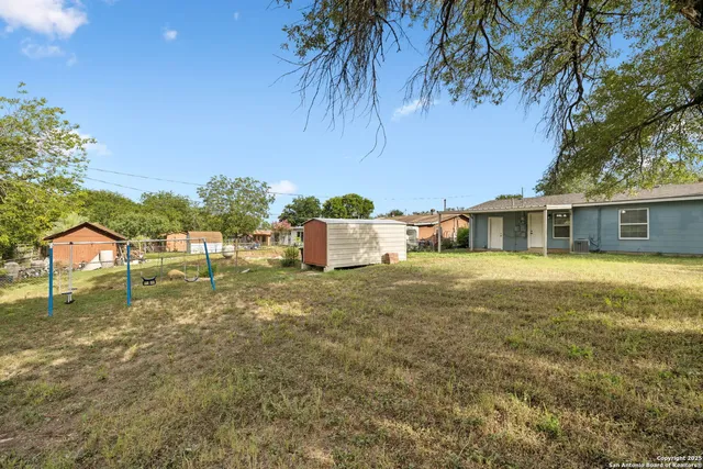 a house view with a garden space