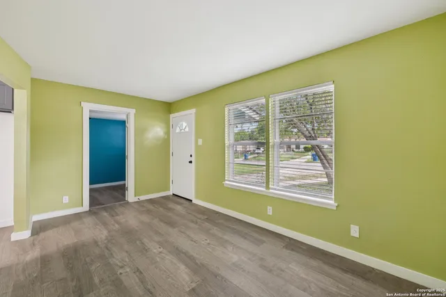 an empty room with windows