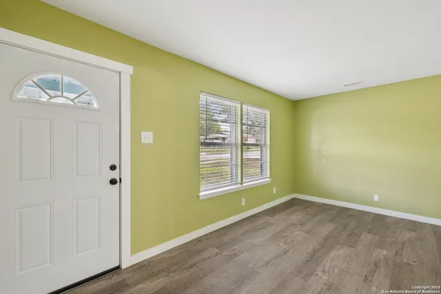 an empty room with a window