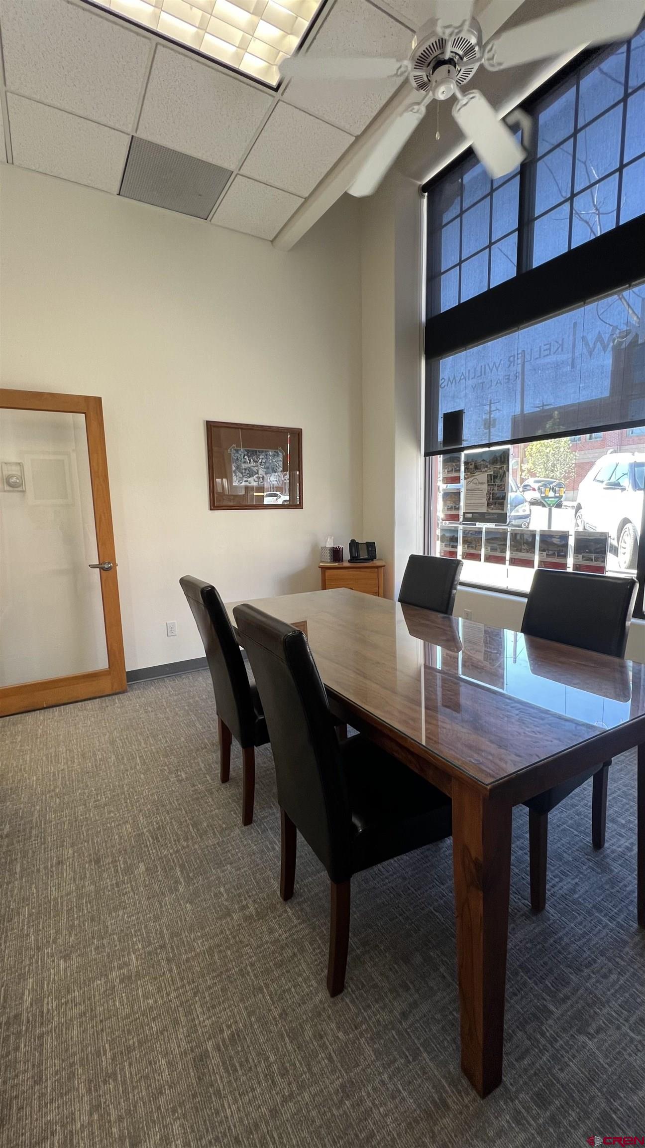 700 Main Avenue, Unit D Durango, CO 81301 - Photo 12 of 13 a view of a dining room with a table and chairs