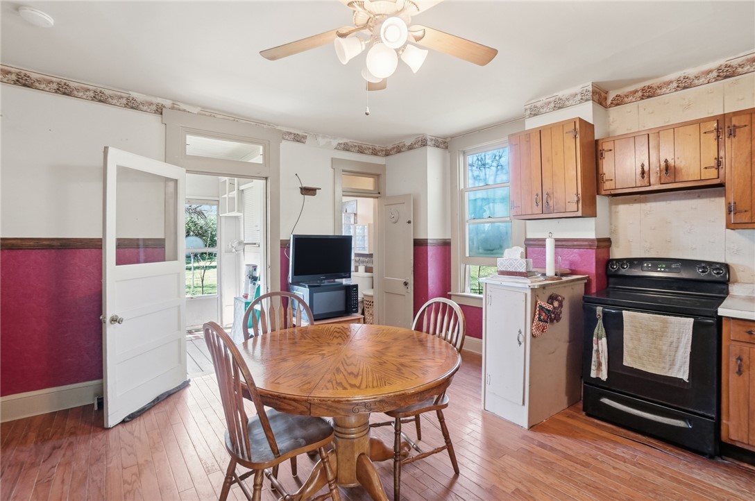 1444 Eagle City Road Springfield, OH 45504 - Photo 22 of 50 This cozy kitchen features a classic aesthetic and offers a perfect setting for casual dining.