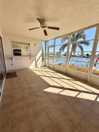 a house with swimming pool in front of it