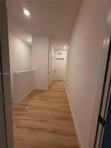 a bathroom with a double vanity sink toilet and shower