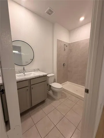 a bathroom with a glass shower
