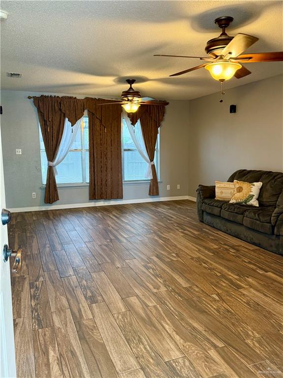 3100 Princeton Avenue McAllen, TX 78504 - Photo 3 of 40 a view of a room with wooden floor