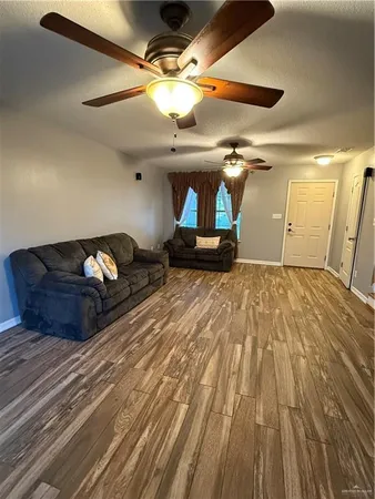a bedroom with a bed and a mirror