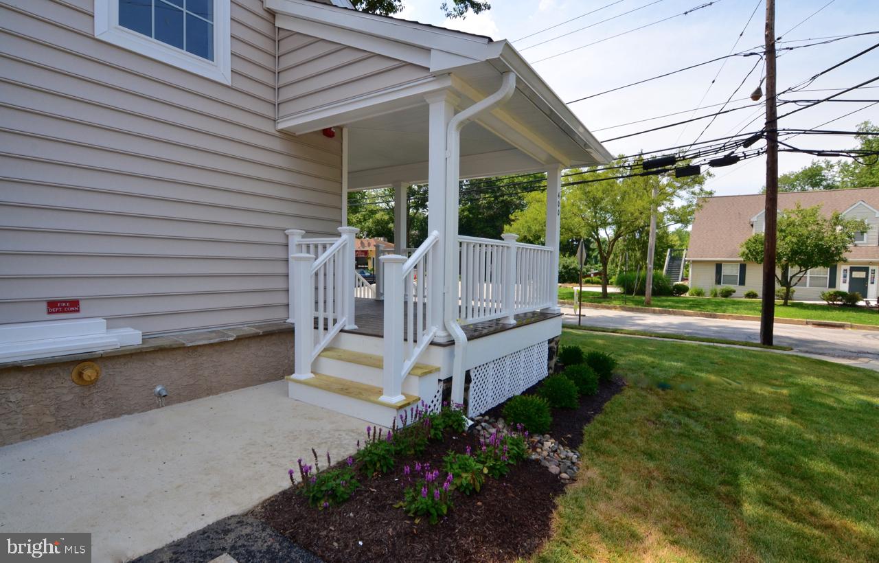 400 West Wayne Avenue, Unit 3 Wayne, PA 19087 - Photo 2 of 14 a view of a house with backyard and sitting area
