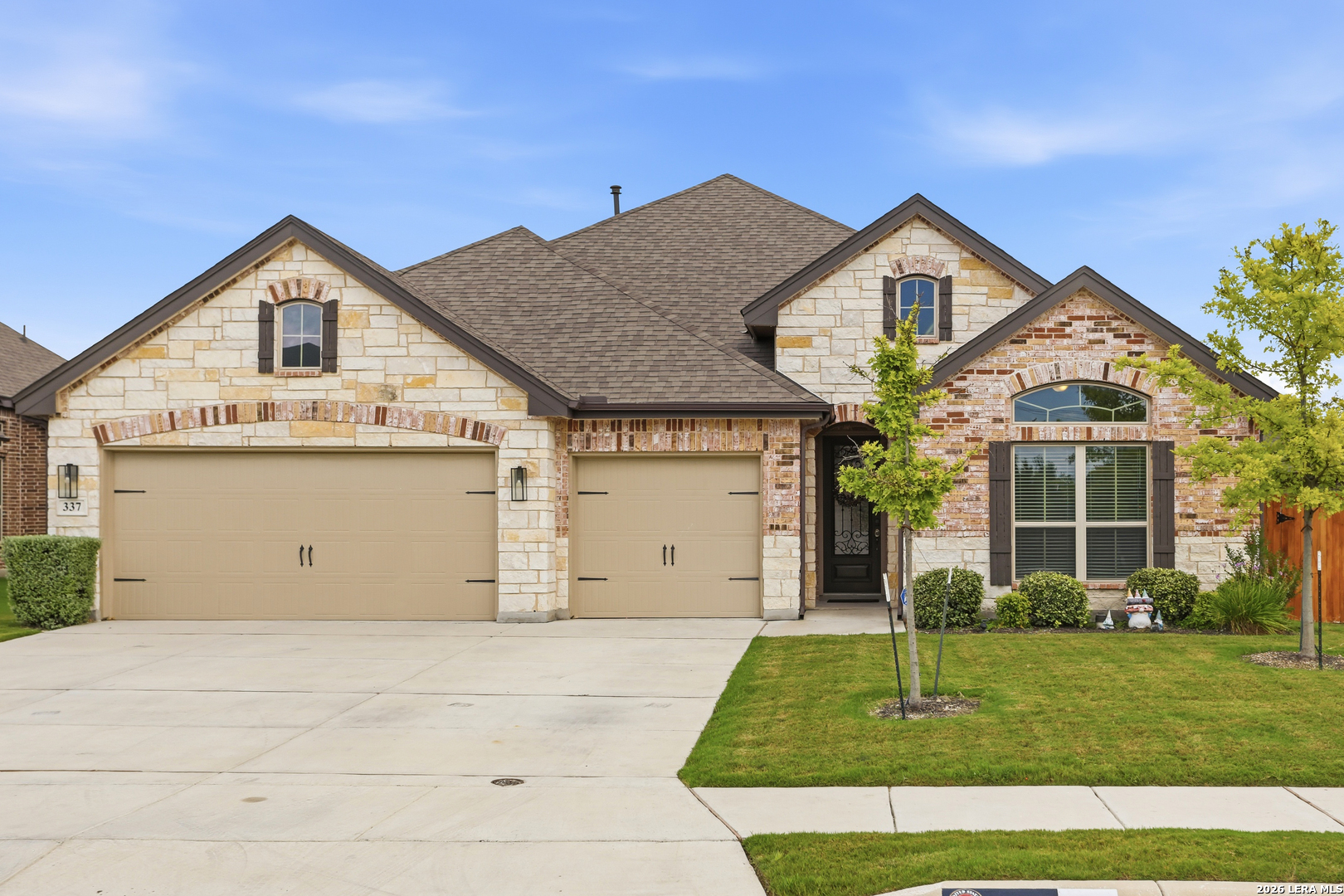 337 Misty Sails Cibolo, TX 78108 - Photo 2 of 50 a front view of a house with a yard