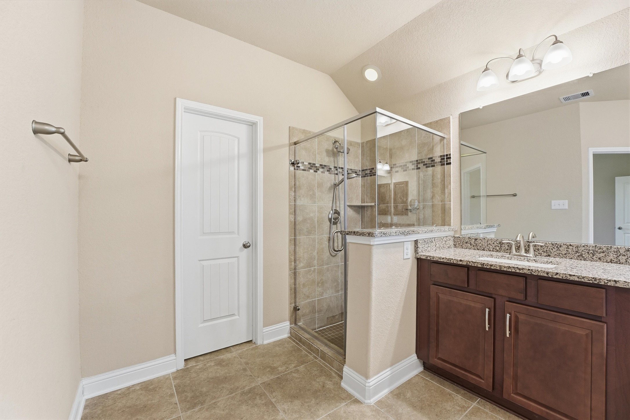 1911 Cedar Ridge Lane Pearland, TX 77089 - Photo 19 of 33 Primary bath with granite, double sinks, soaking tub, separate shower, and a large walk-in closet.