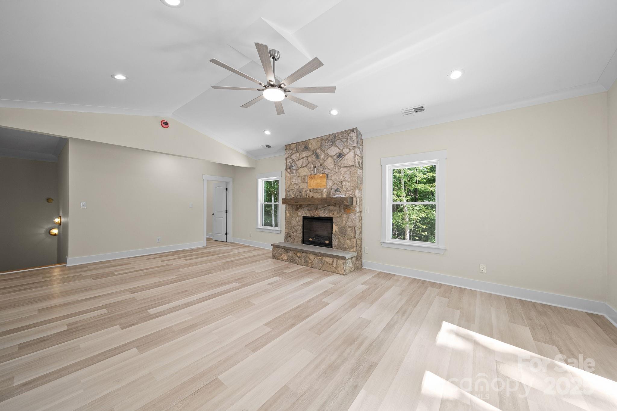 4460 R R L Lane Midland, NC 28107 - Photo 13 of 48 a view of an empty room with a window and fireplace