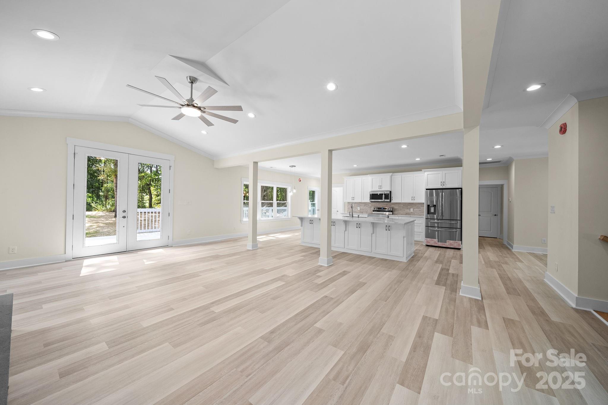 4460 R R L Lane Midland, NC 28107 - Photo 15 of 48 a view of a living room a kitchen and windows