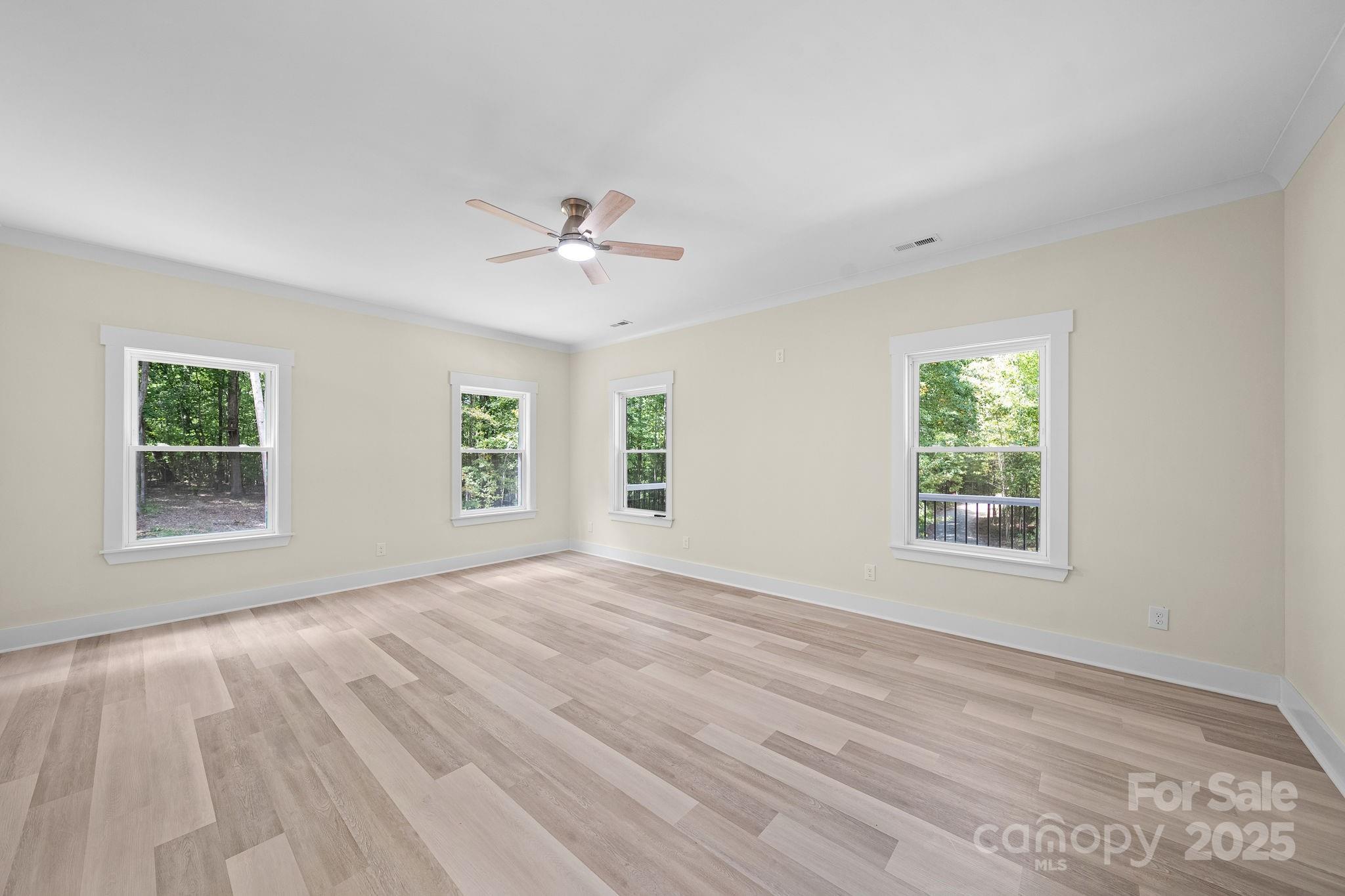 4460 R R L Lane Midland, NC 28107 - Photo 21 of 48 a view of an empty room with a window and wooden floor