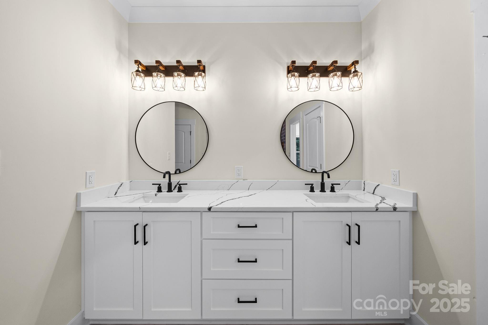 4460 R R L Lane Midland, NC 28107 - Photo 29 of 48 a bathroom with a double vanity sink and a mirror