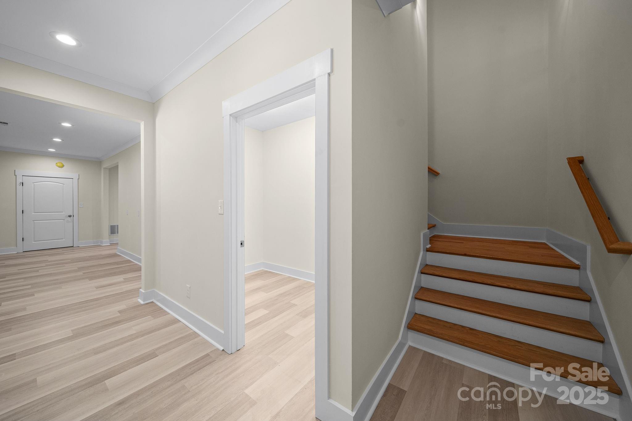 4460 R R L Lane Midland, NC 28107 - Photo 35 of 48 a view of a hallway with wooden floor and entryway