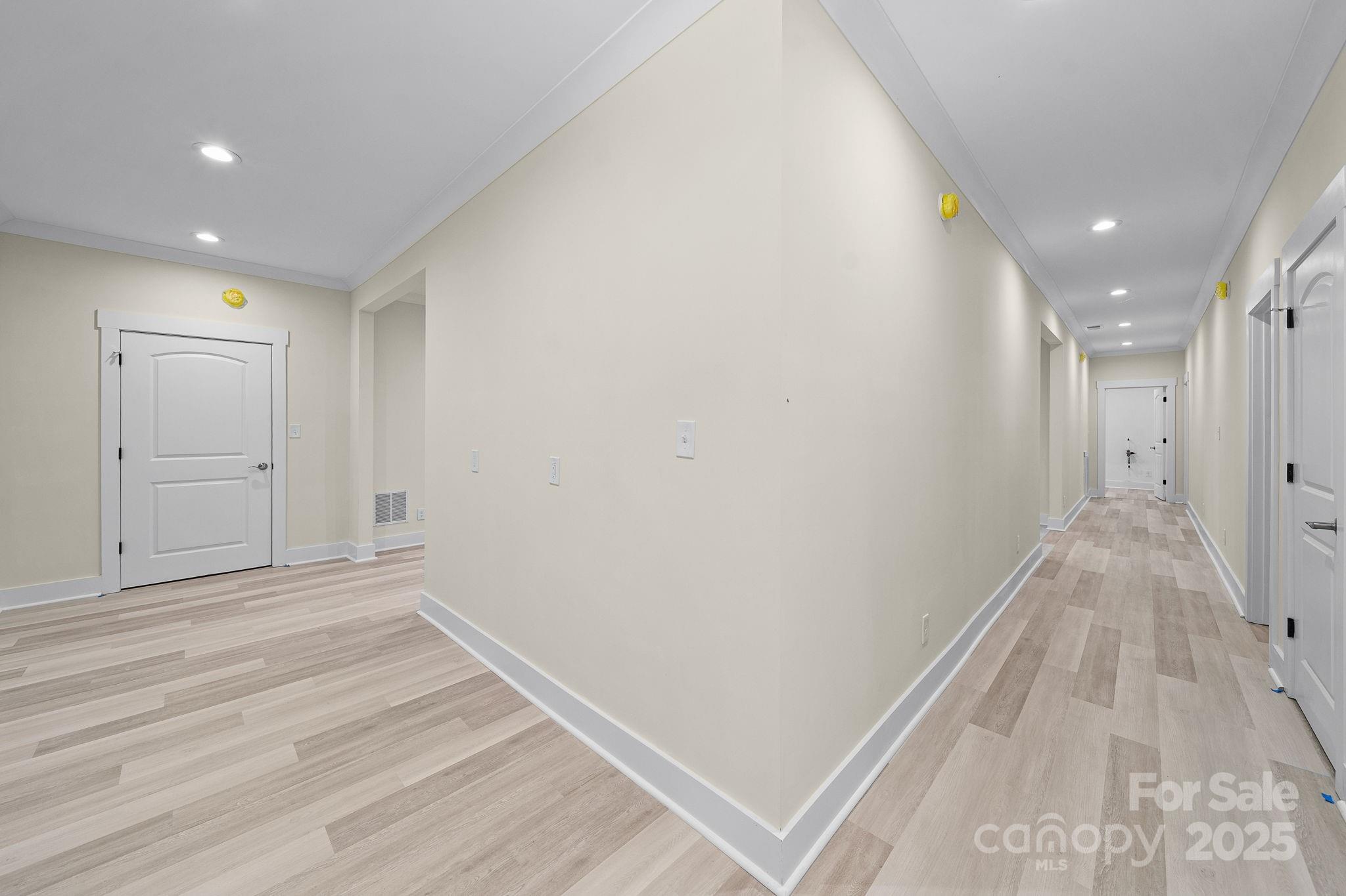 4460 R R L Lane Midland, NC 28107 - Photo 36 of 48 a view of a hallway with wooden floor