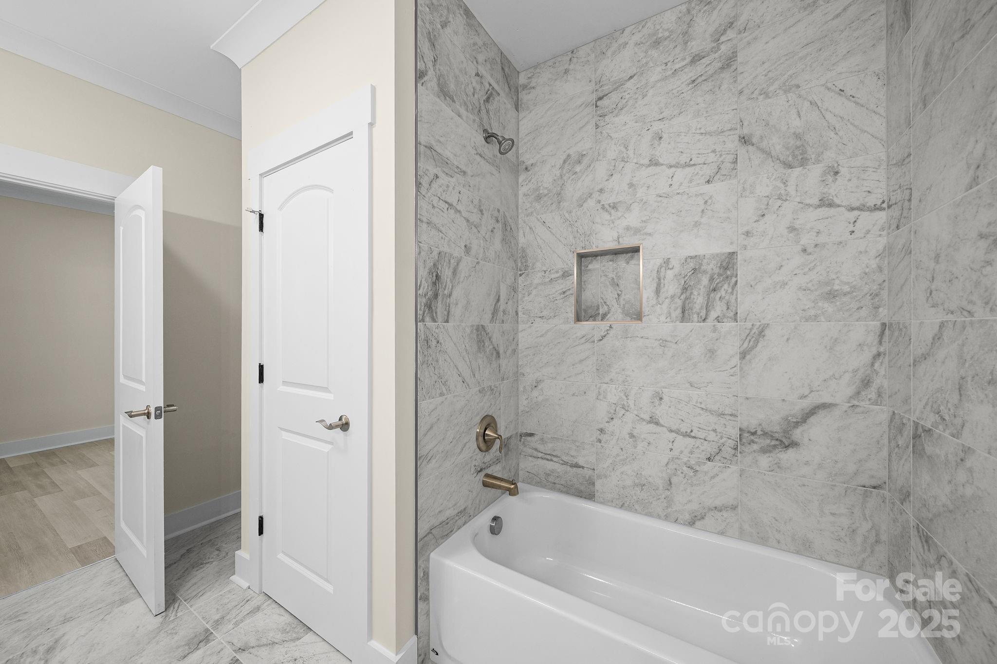 4460 R R L Lane Midland, NC 28107 - Photo 42 of 48 a bathroom with a bathtub