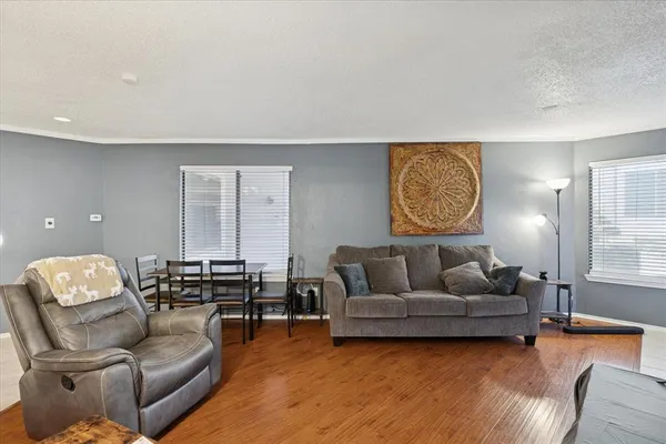a living room with furniture and a couch