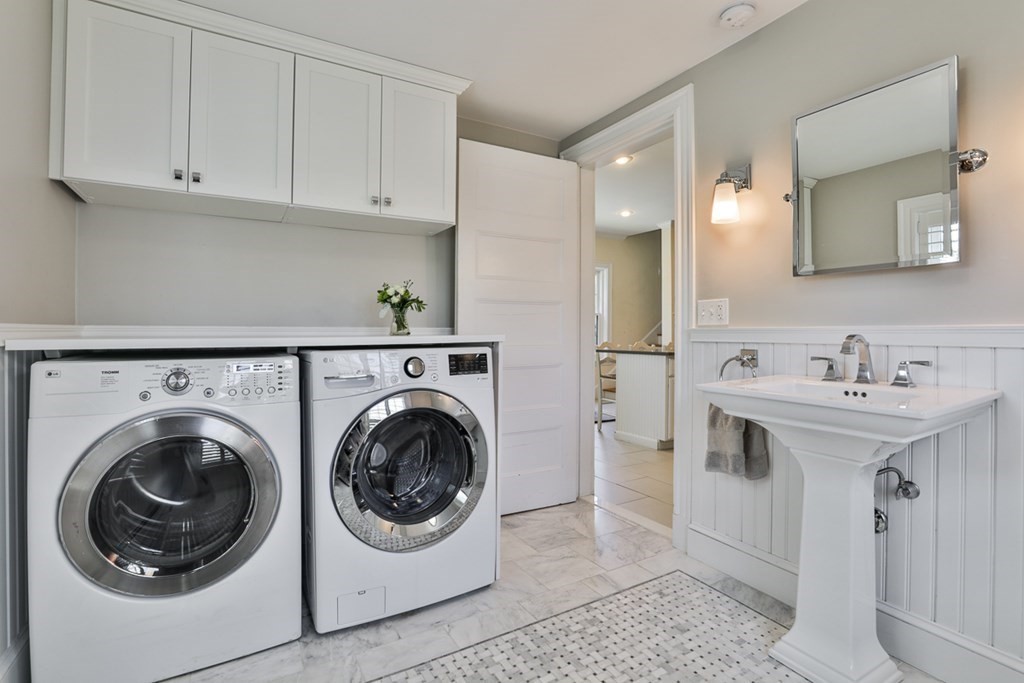 27 Walnut Road Hamilton, MA 01982 - Photo 19 of 42 a utility room with sink dryer and washer