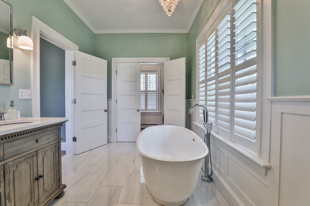 27 Walnut Road Hamilton, MA 01982 - Photo 31 of 42 a bathroom with a sink a toilet and shower
