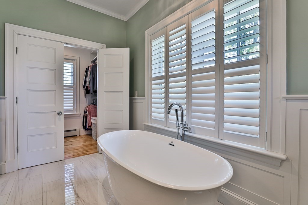 27 Walnut Road Hamilton, MA 01982 - Photo 33 of 42 a bathroom with a sink and a mirror