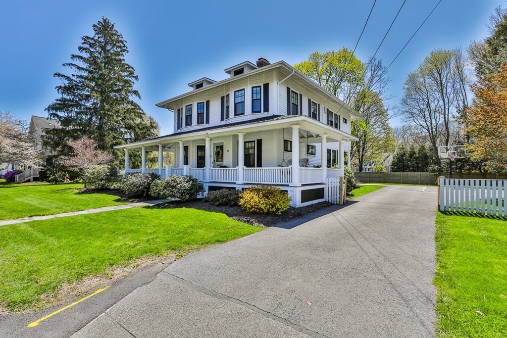 27 Walnut Road Hamilton, MA 01982 - Photo 41 of 42 a front view of a house with a yard and trees
