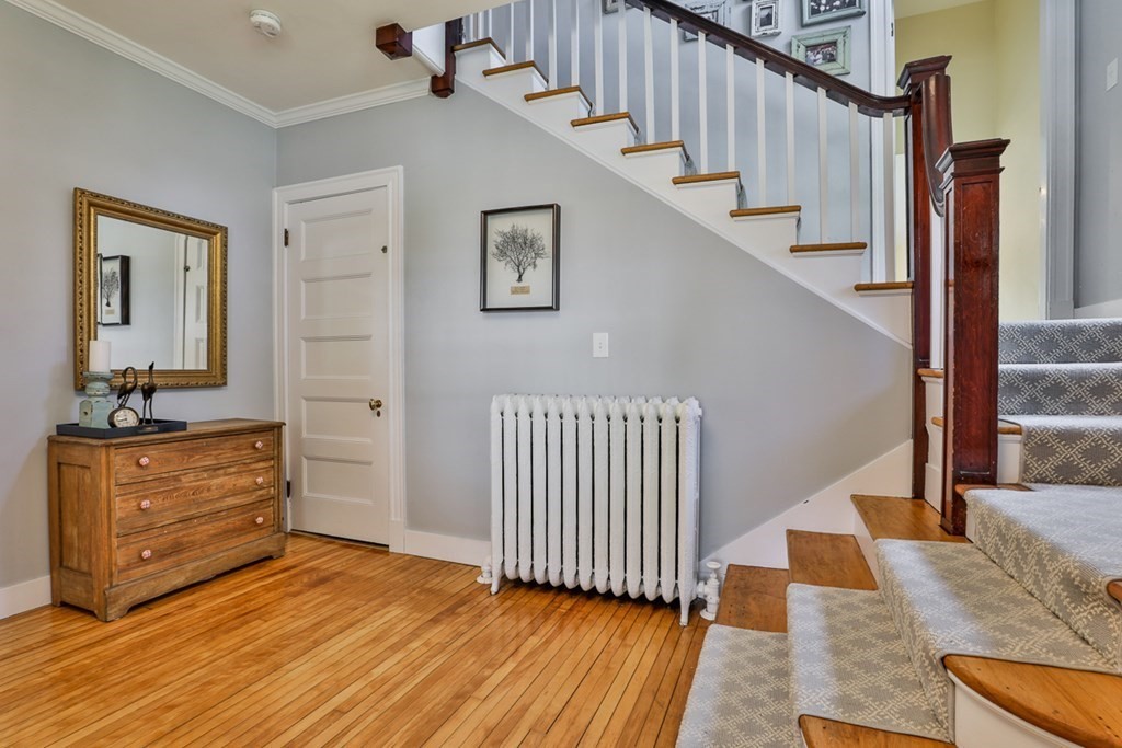 27 Walnut Road Hamilton, MA 01982 - Photo 6 of 42 a view of entryway and hall with wooden floor