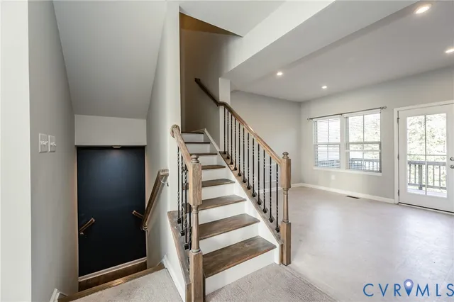 a view of entryway with stairs