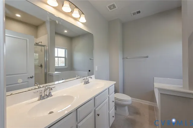 a bathroom with a shower and sink