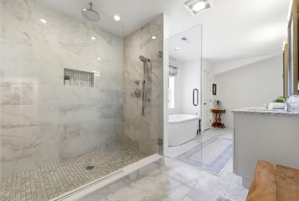 a bathroom with a shower and a toilet